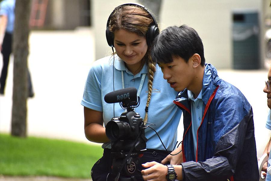 Two filmmaking students work together during Film & New Media course at Interlochen Arts Camp